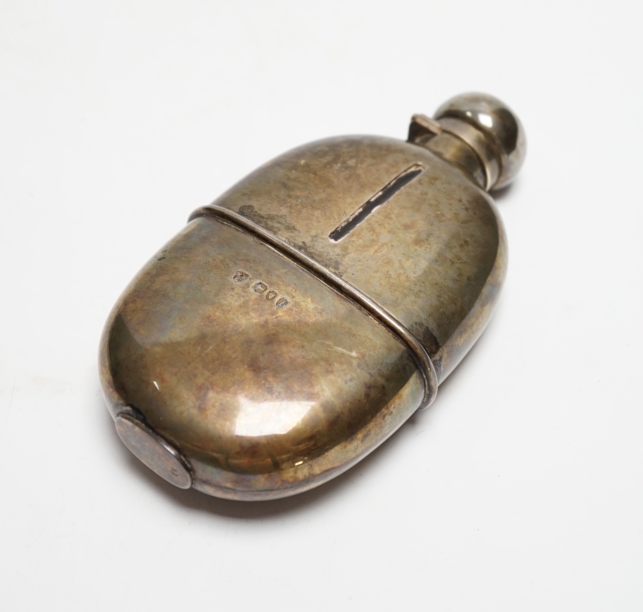 A late Victorian silver mounted glass hip flask, W & G Neal, London, 1894, 15.2cm.